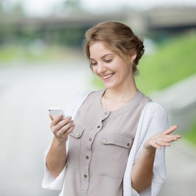 Pic - happy woman with phone
